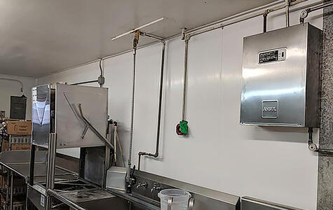 Trusscore white wallandceilingboard installed in a commercial kitchen